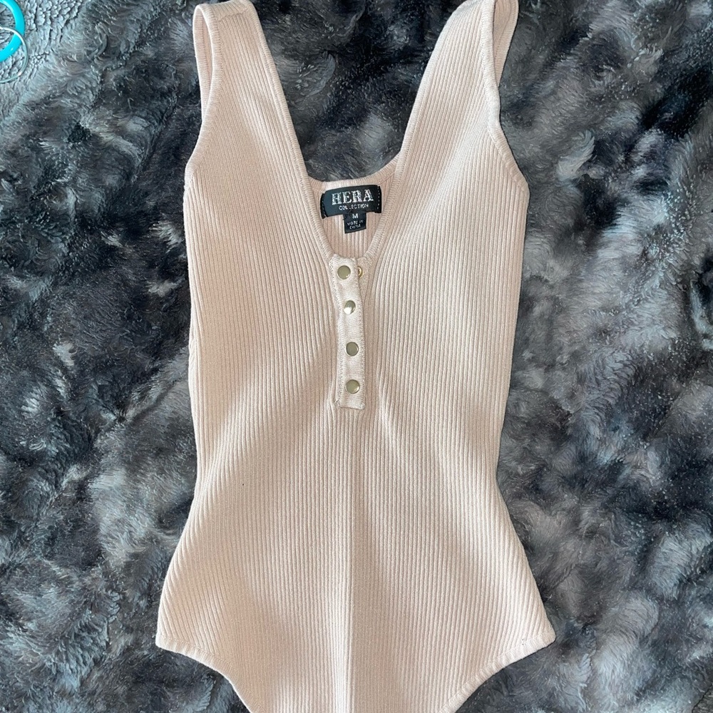 Tan body suit